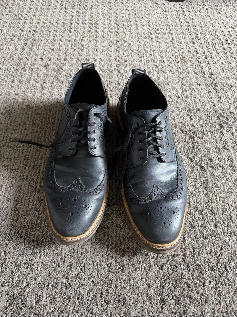Cole Haan Black Leather Wingtip Derby with Tan Welt